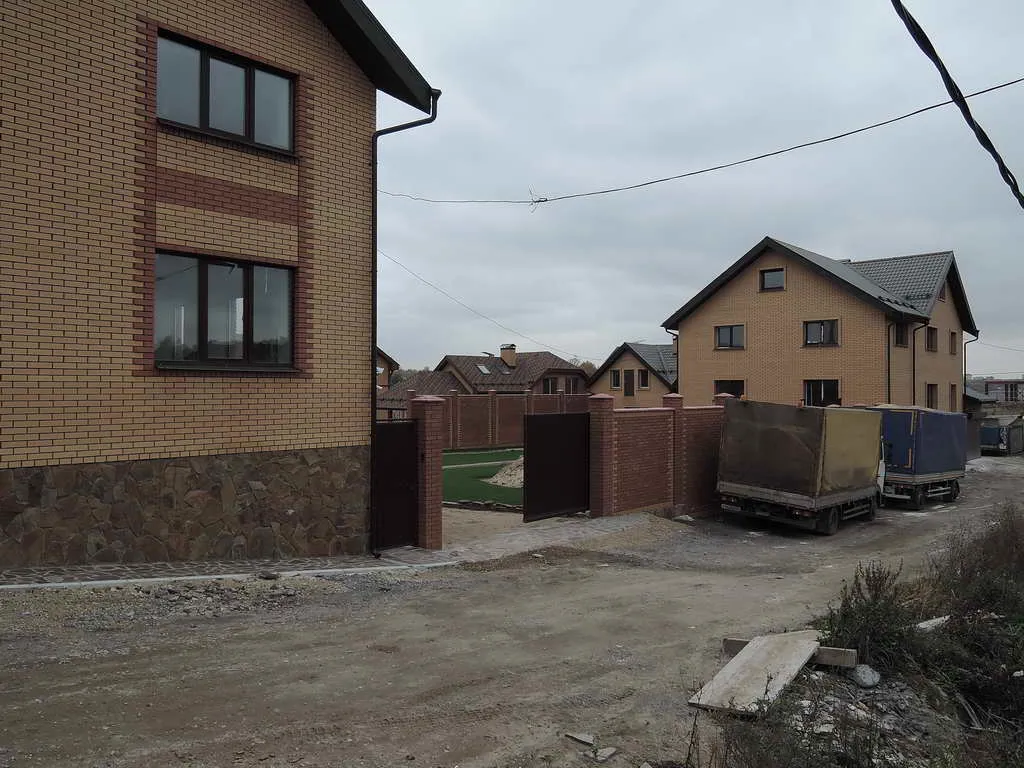 Рыжекирпичный дом у озера, фото 5