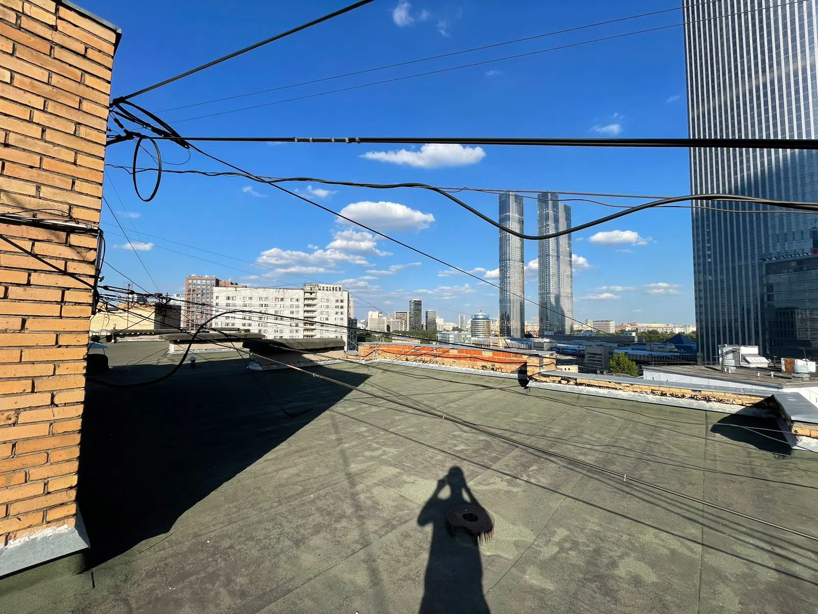 Крыша с видом на небоскрёбы, фото 7